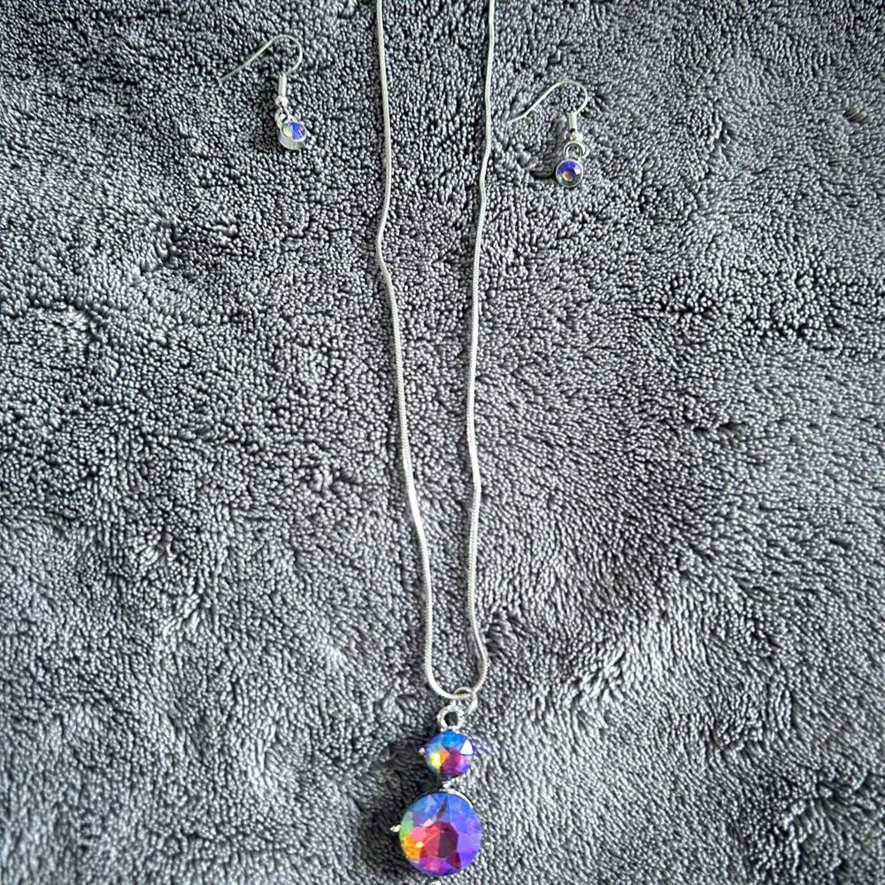 Purple and Silver multifaceted glass necklace with earrings.